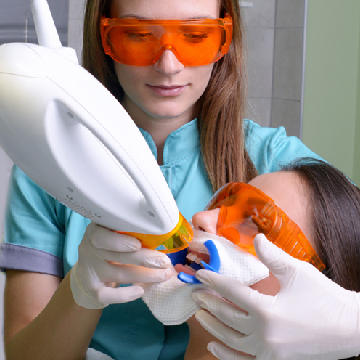 Women getting laser treatment for Gum disease treatment